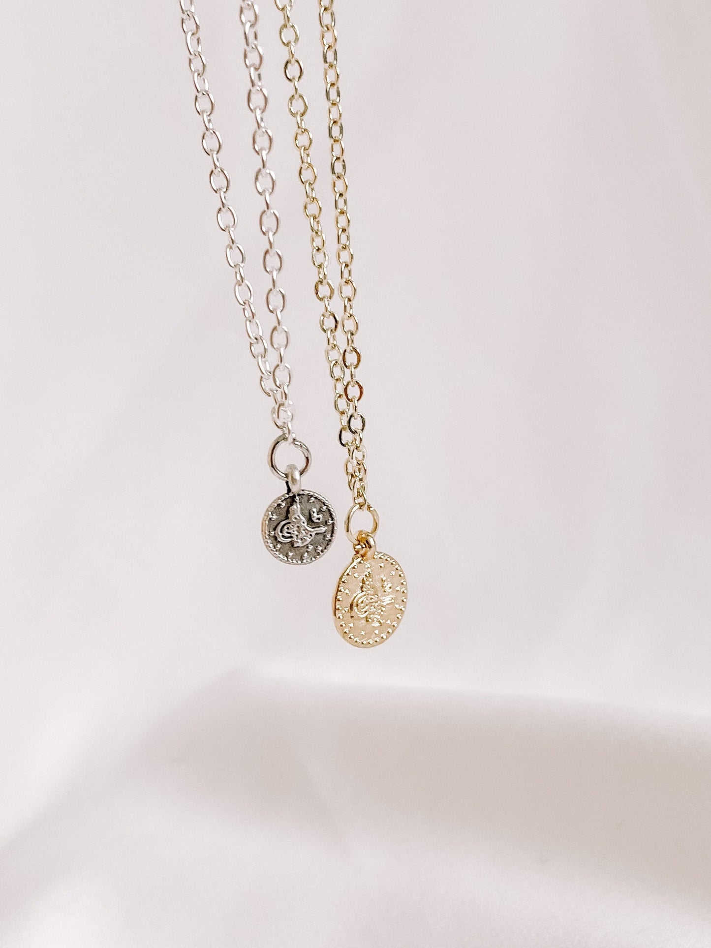 Coin charm necklace