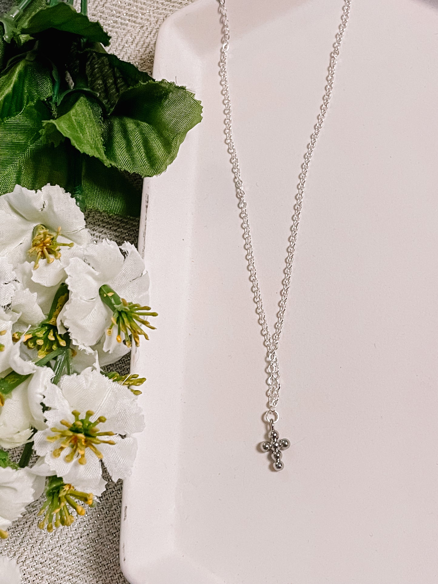 Cross charm necklace