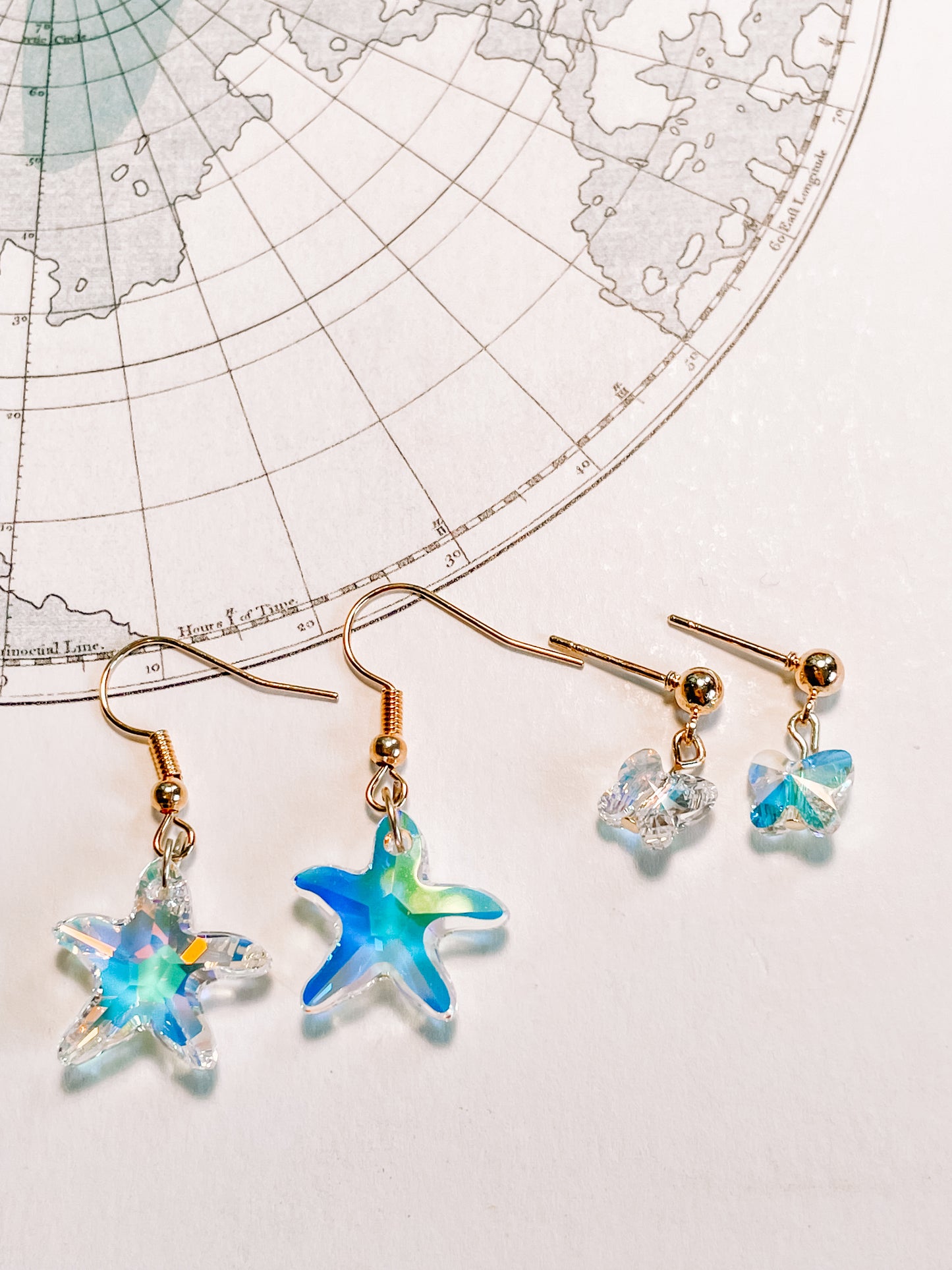 Swarovski iridescent star fish earrings