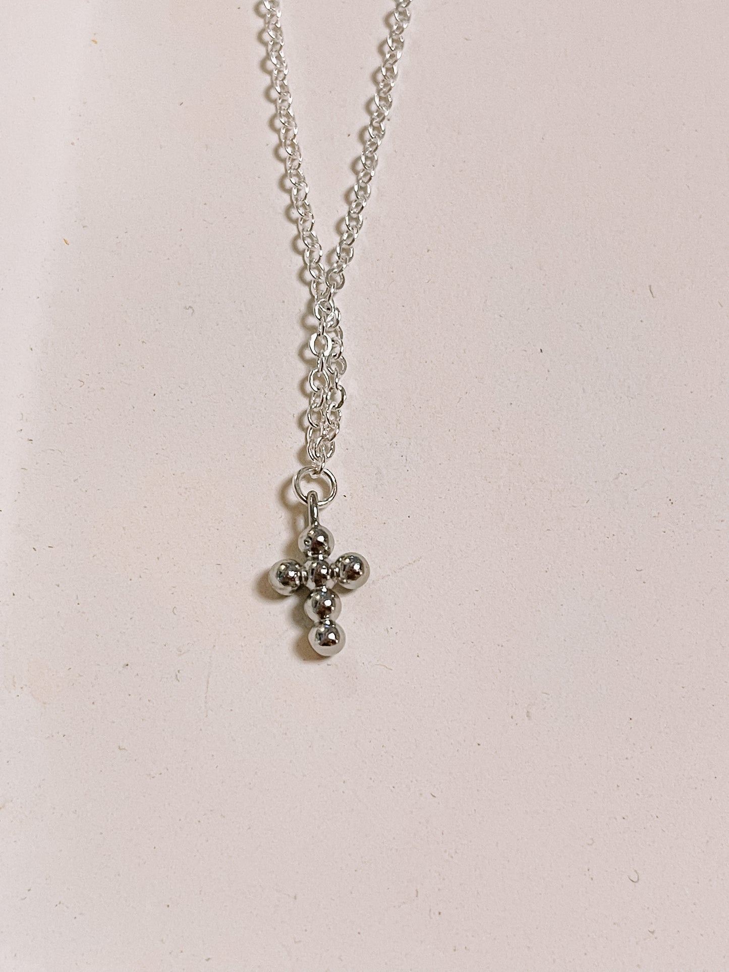 Cross charm necklace