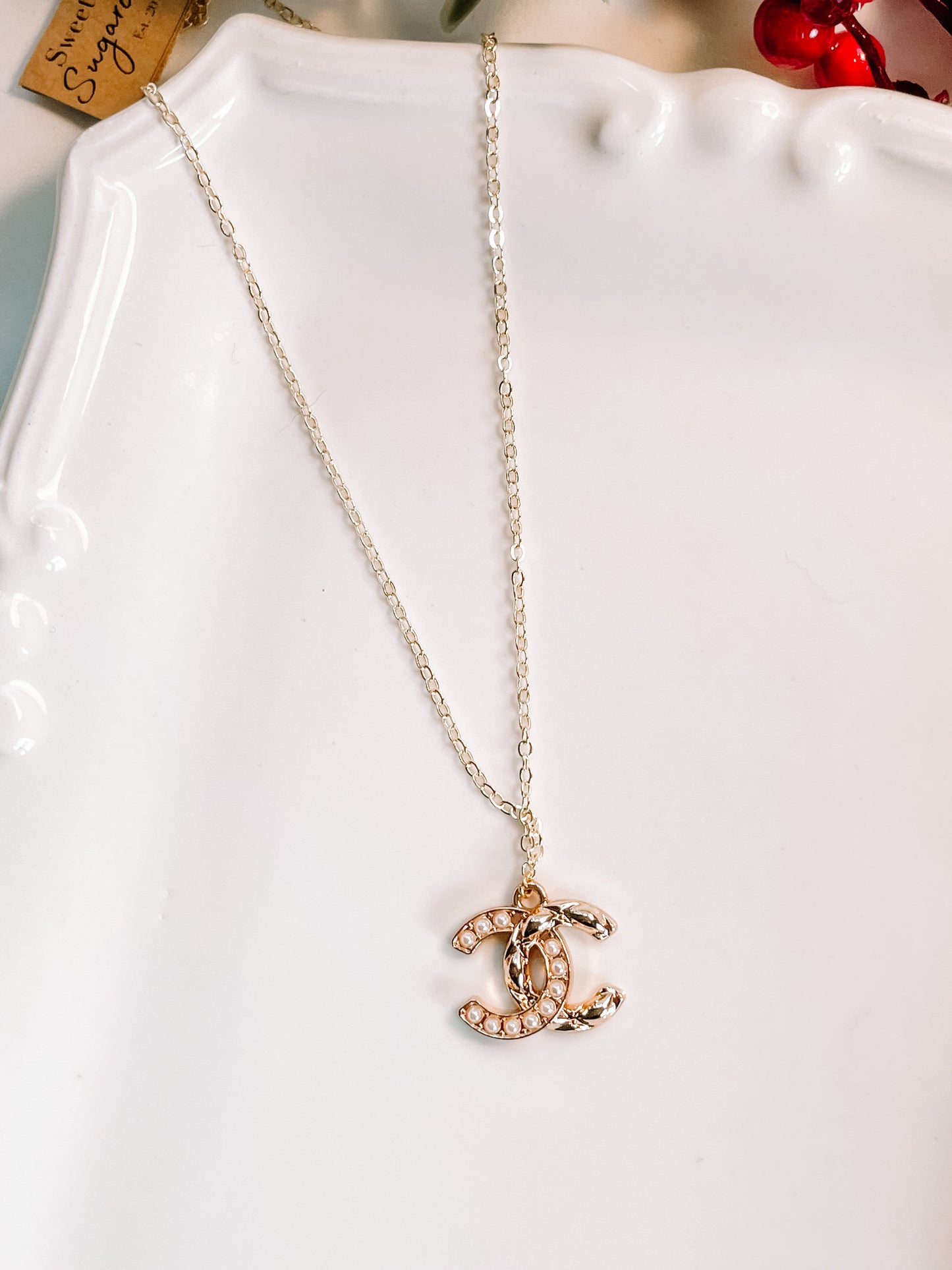 Chanel charm necklace