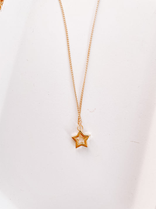Star cutout charm necklace