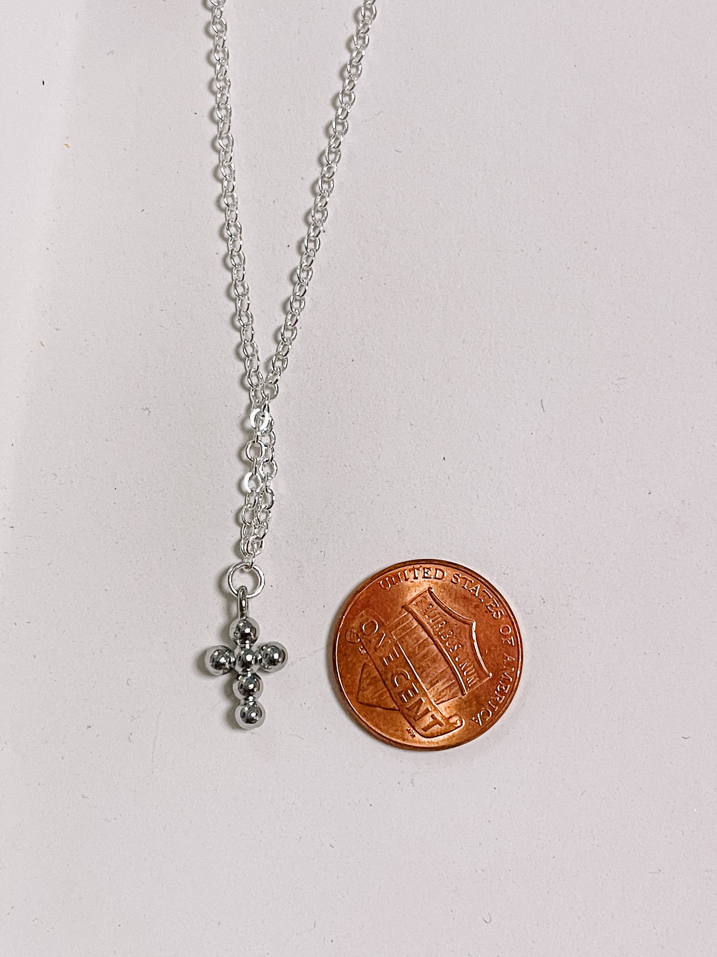 Cross charm necklace